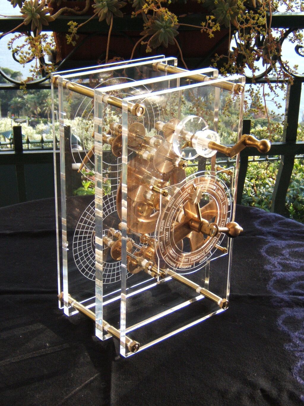 A reconstructed front panel of the Antikythera mechanism, with concentric ring dials showing the Egyptian calendar, the Greek zodiac, and pointer positions for the Sun, Moon, and the five known planets