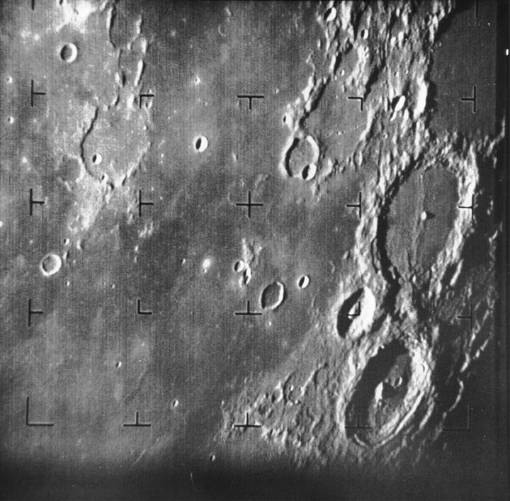 First close-up photograph of the Moon returned by a U.S. spacecraft — Ranger 7 B-camera frame, 31 July 1964, showing the craters Alphonsus, Ptolemaeus, and Arzachel above Mare Nubium. (NASA / JPL)