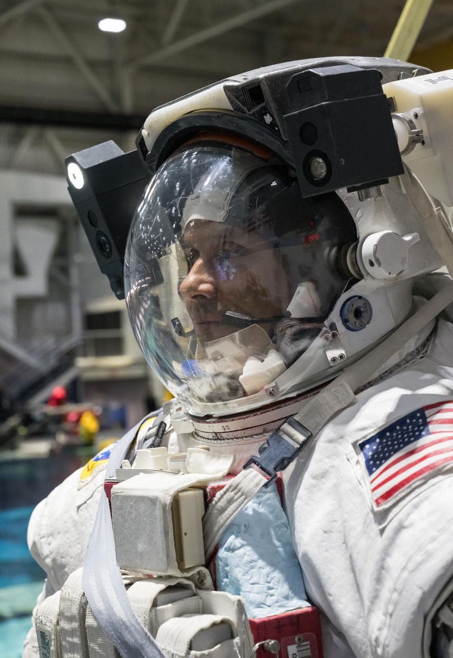 NASA astronaut Anil Menon participates in a spacewalk training session at Johnson Space Center's Neutral Buoyancy Laboratory, ahead of his upcoming mission to the International Space Station. (NASA / James Blair, Feb. 10, 2026)